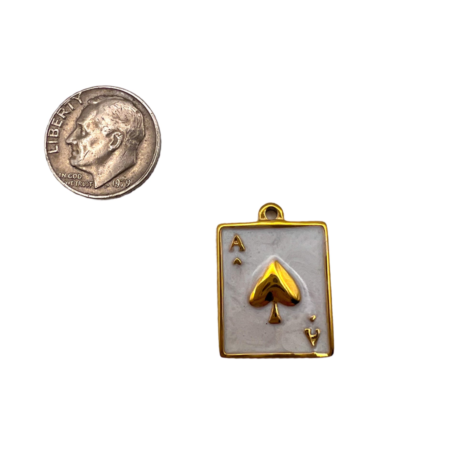 Gold playing card pendant with ace of spades design 