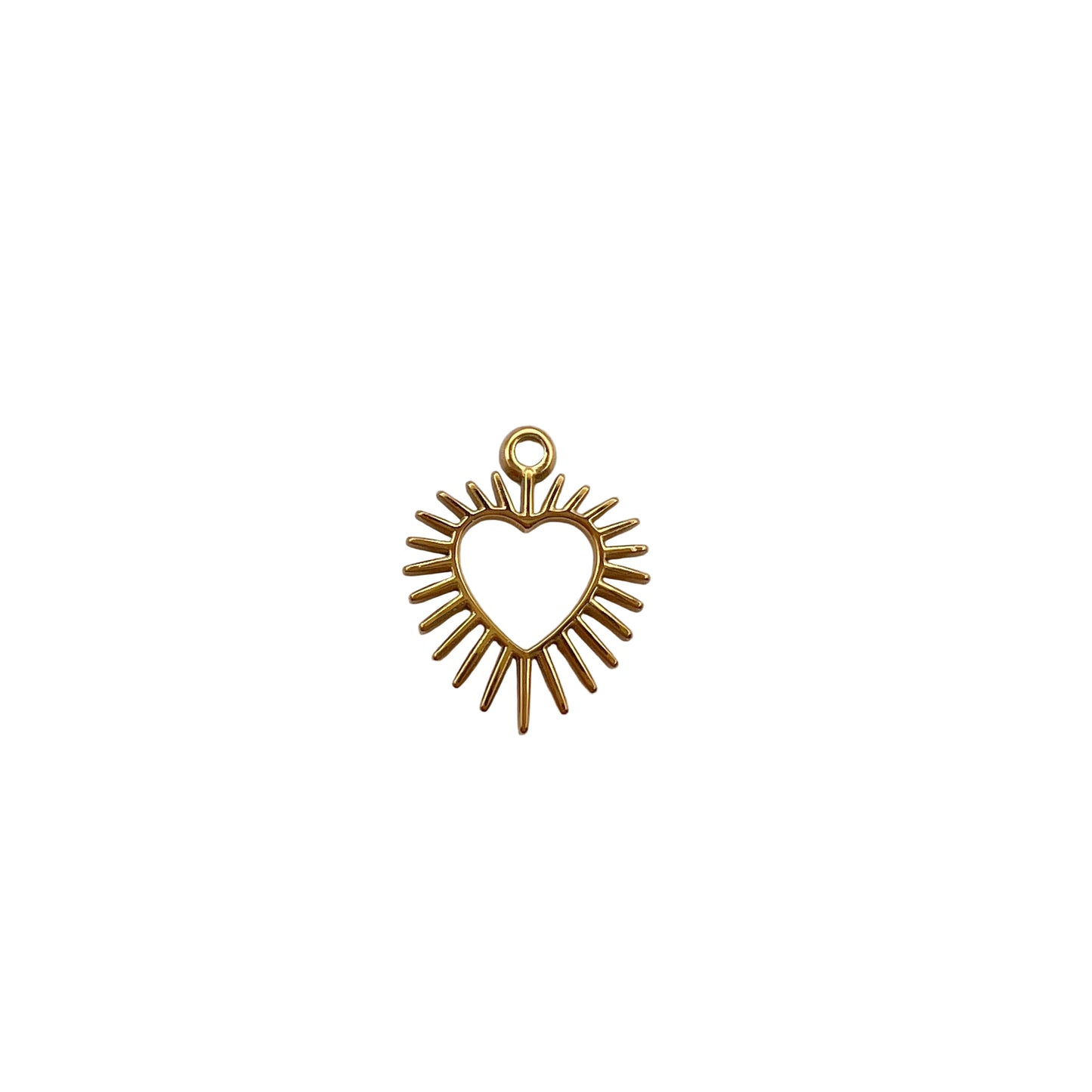 Gold heart-shaped pendant with sunburst design on a white background