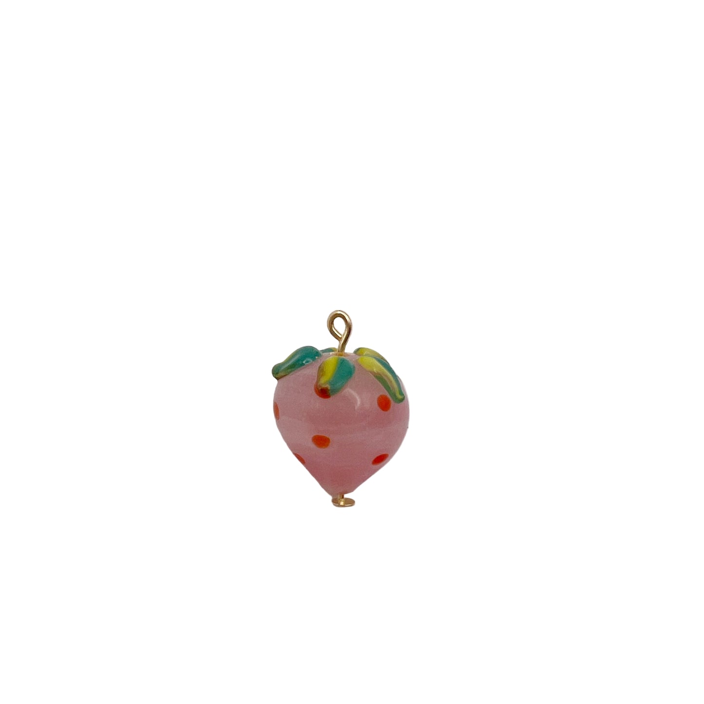 Pink strawberry-shaped charm with green leaves on a white background