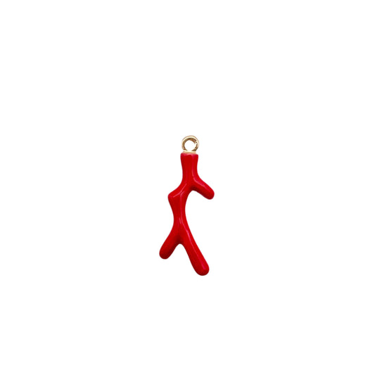 Red coral-shaped pendant on a white background