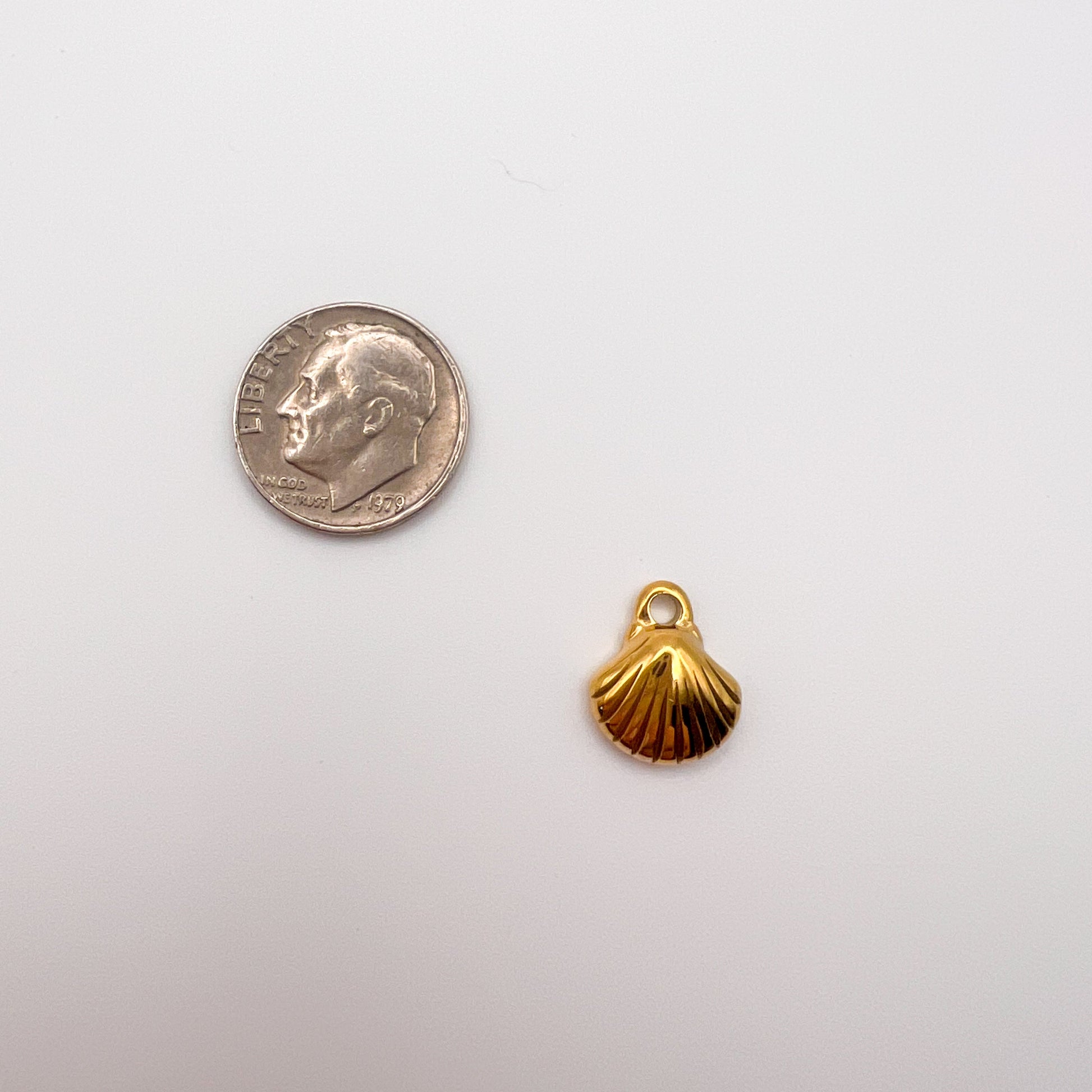 Gold shell charm 