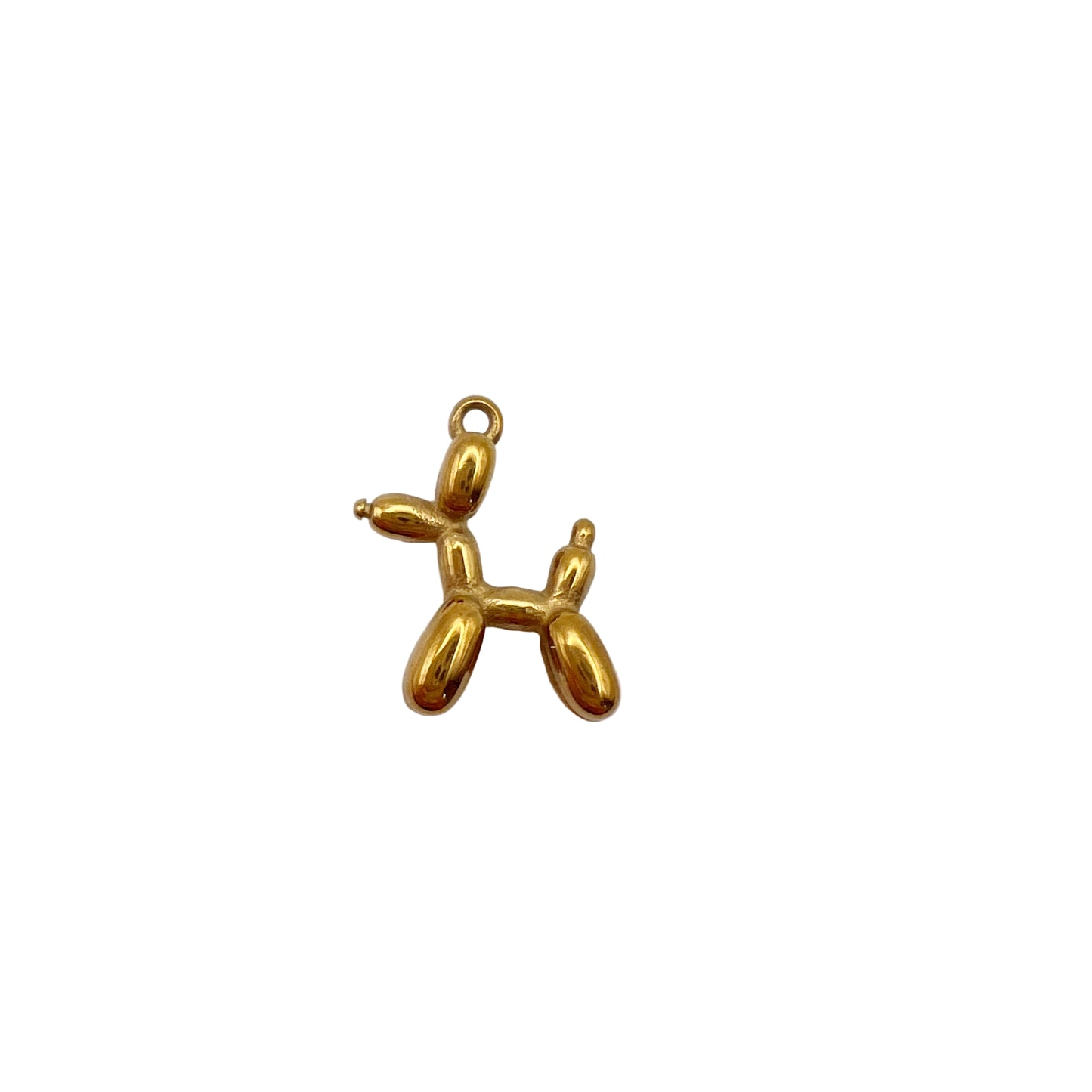 Gold balloon dog charm on a white background