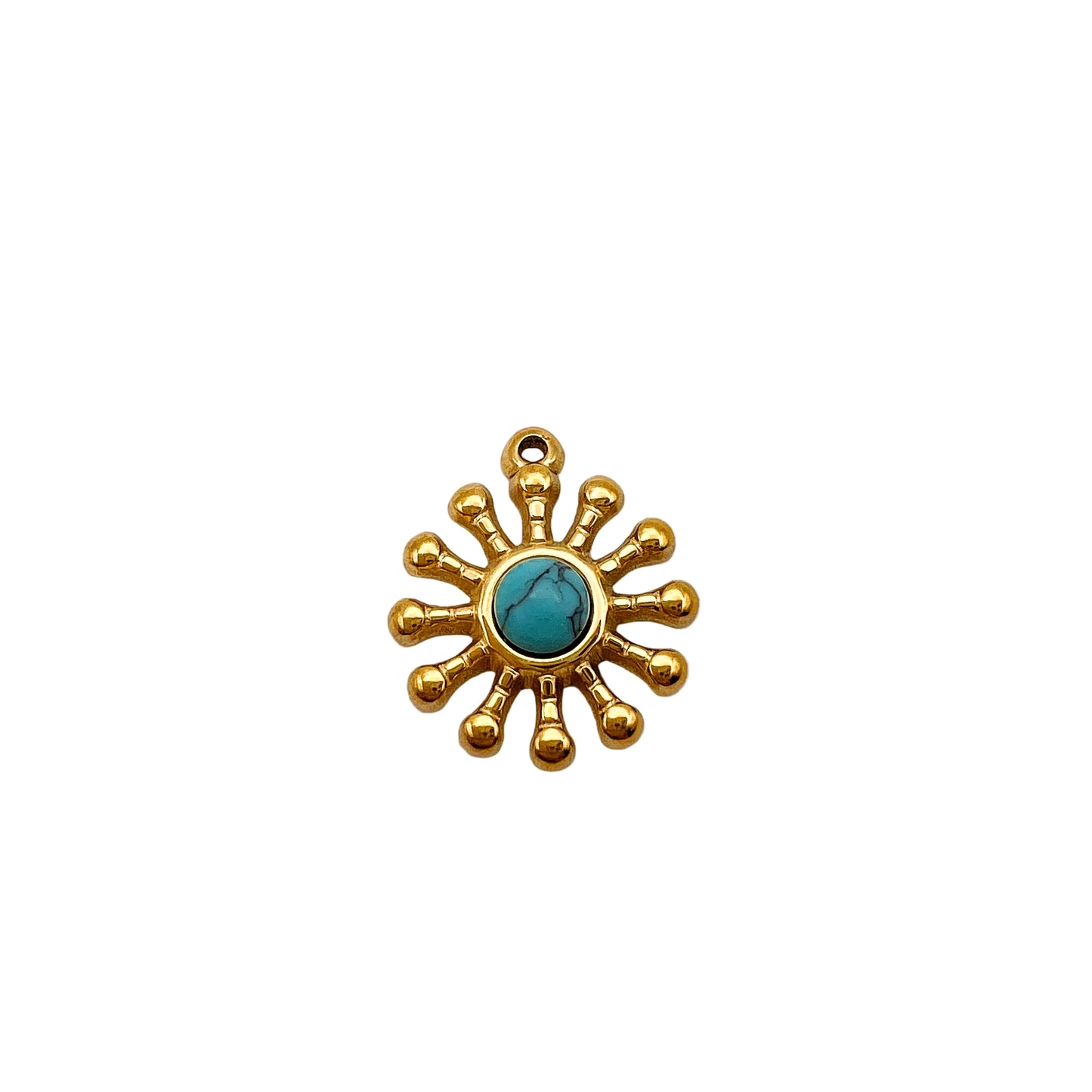 Gold sun-shaped pendant with a turquoise center on a white background