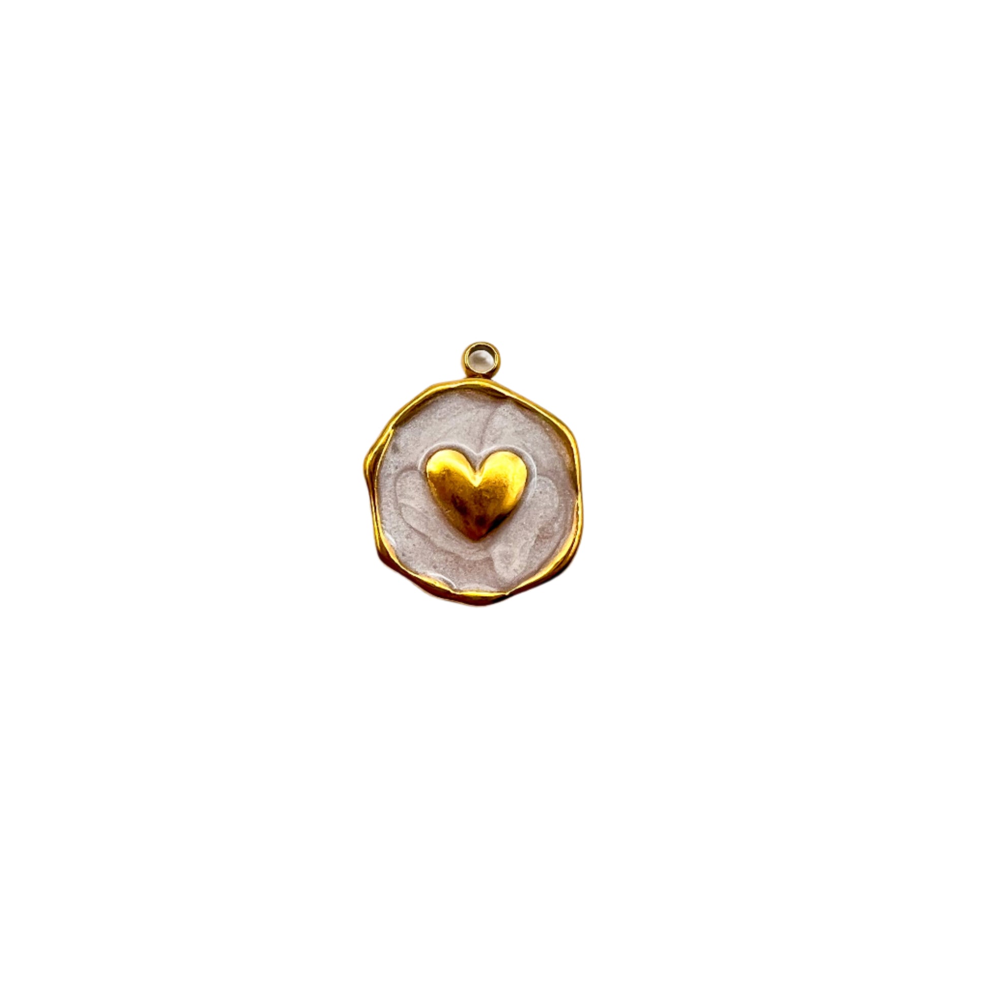 Gold pendant with a heart design on a white background