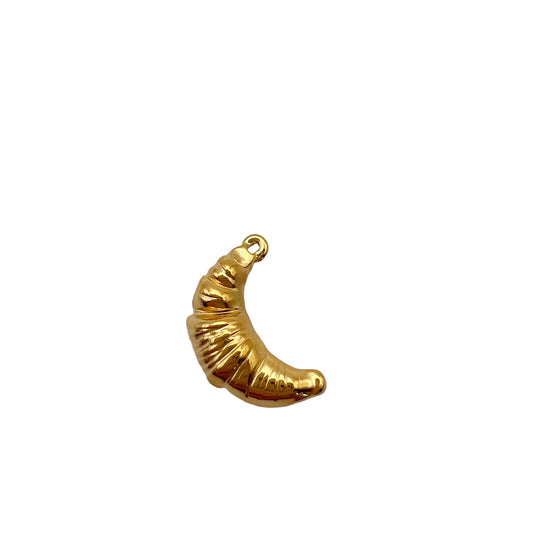 Gold crescent moon charm on a white background