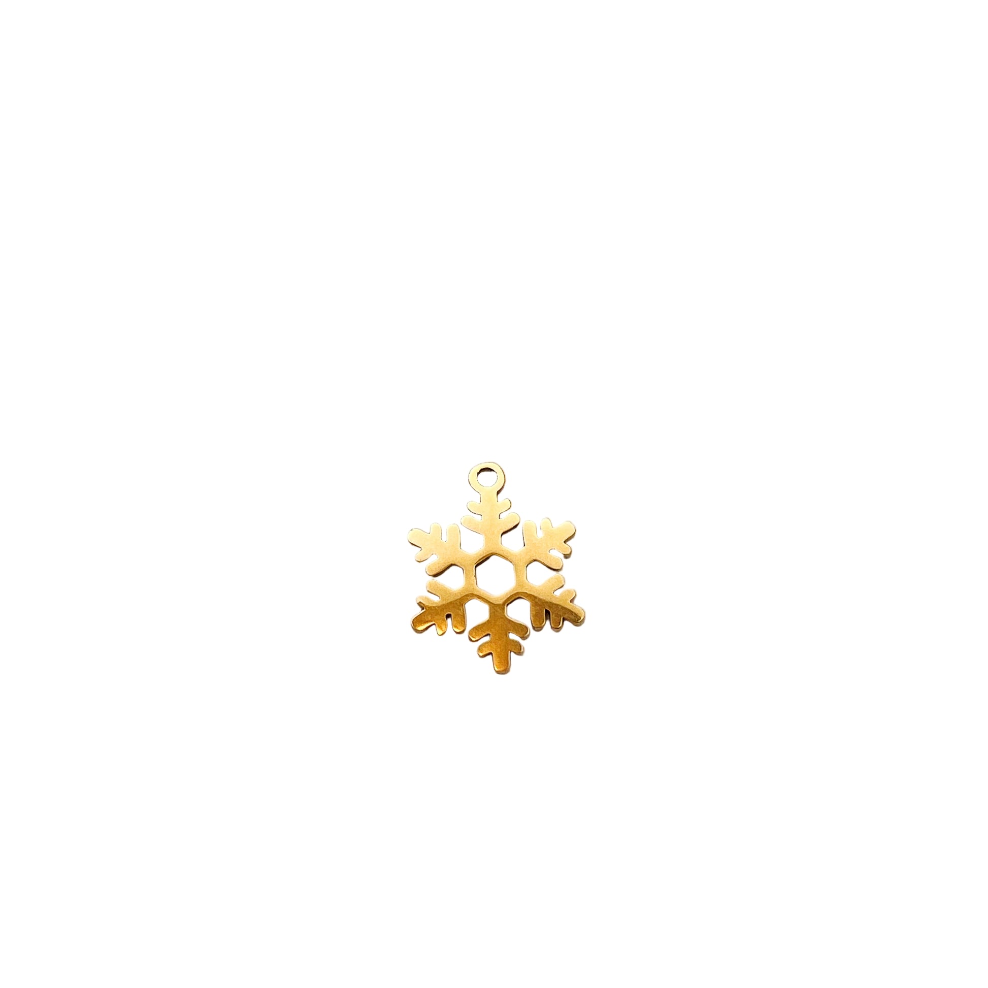 Gold snowflake pendant on a light gray background