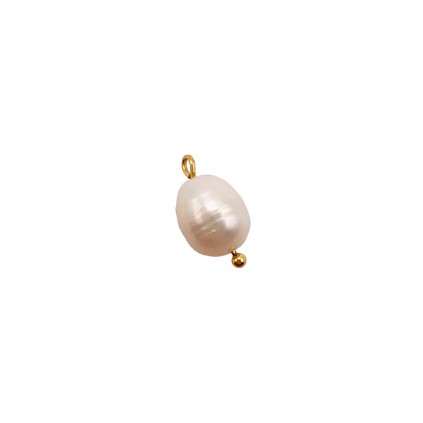 Pearl pendant with gold bail on a light gray background