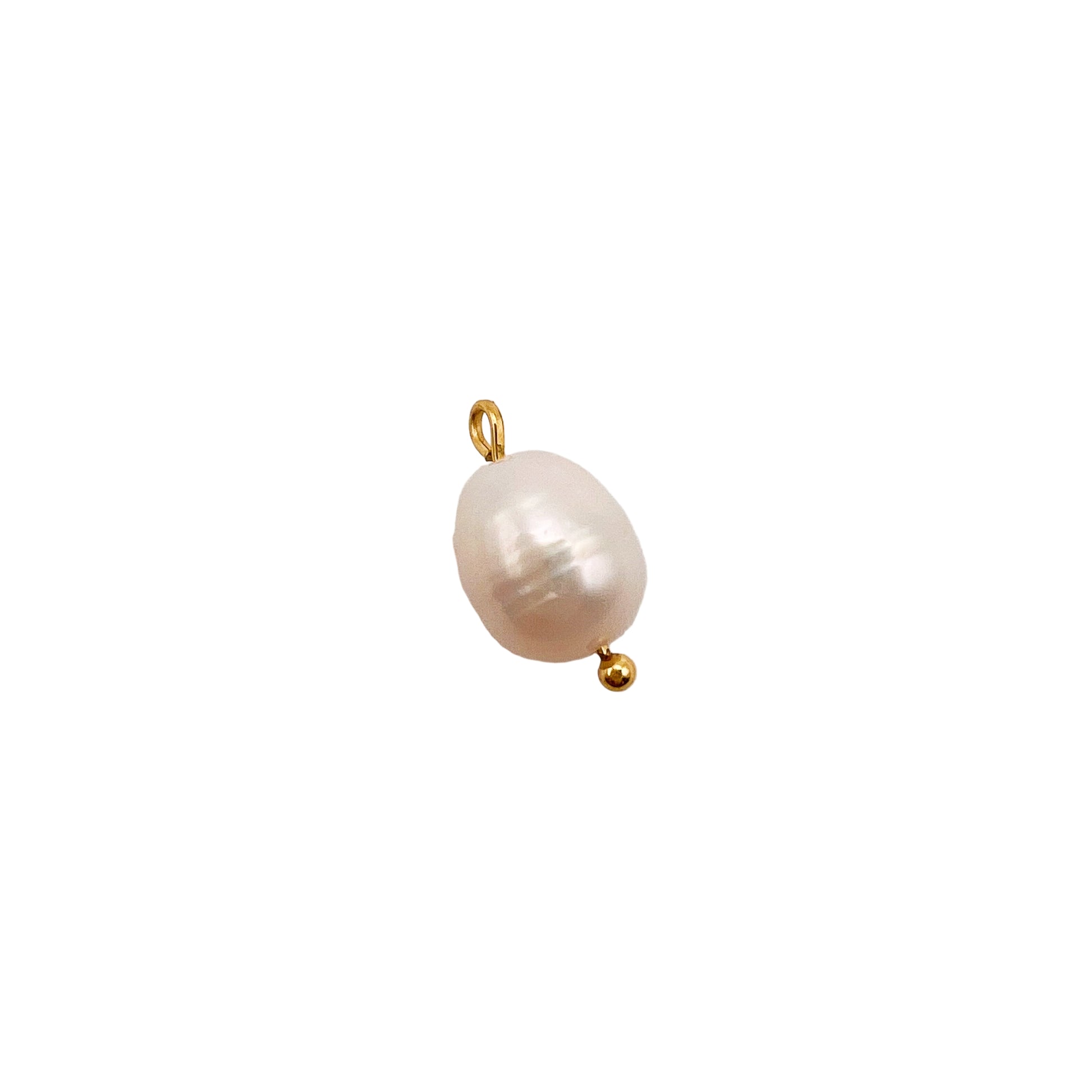 Pearl pendant with gold bail on a light gray background