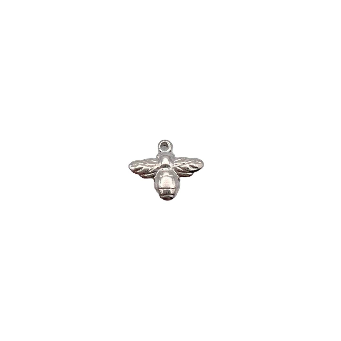 Silver bee-shaped charm on a light gray background