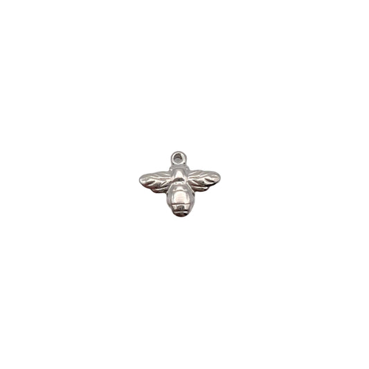 Silver bee-shaped charm on a light gray background