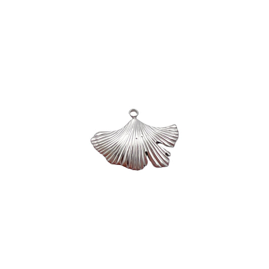 Silver shell pendant on a light gray background