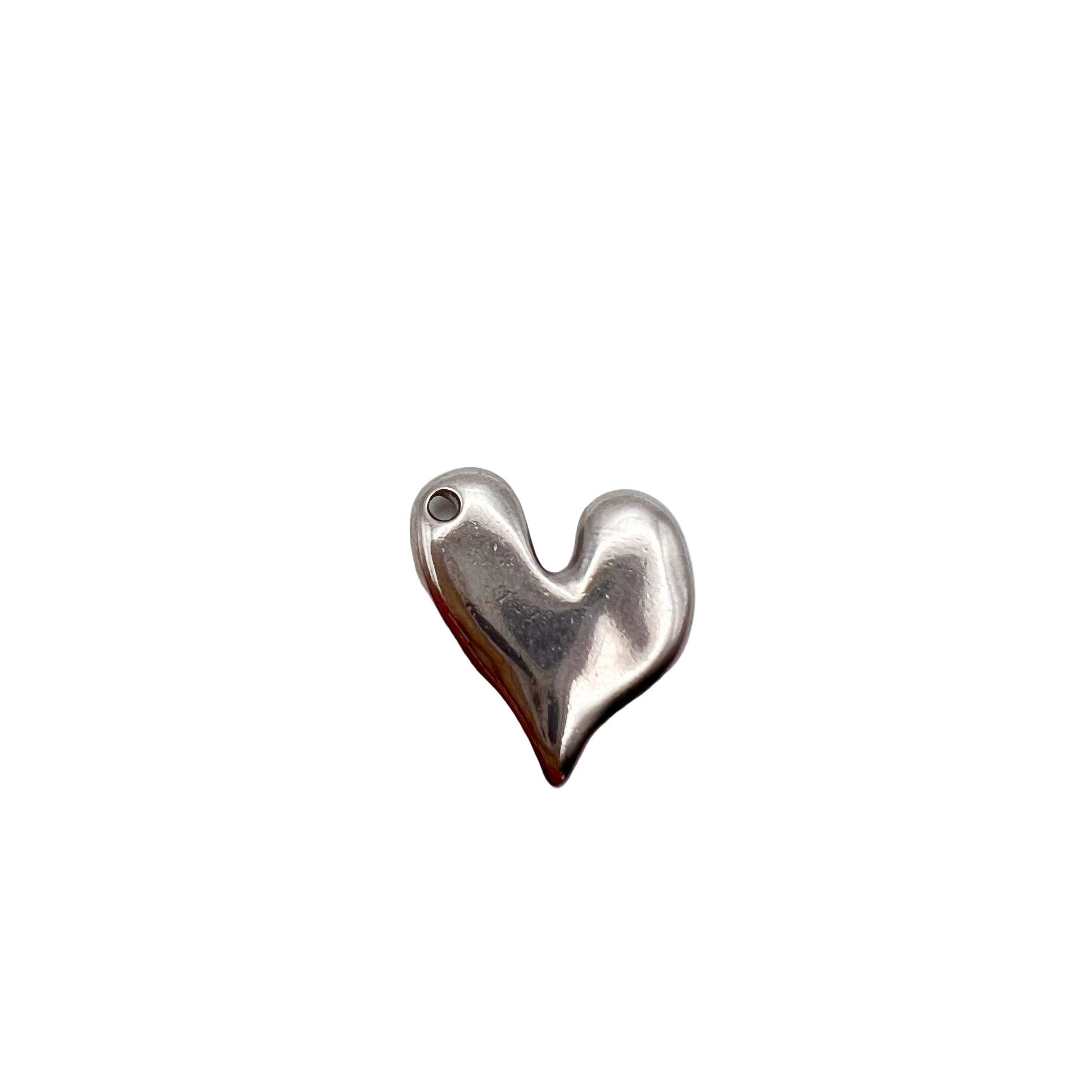 Silver heart-shaped pendant on a white background