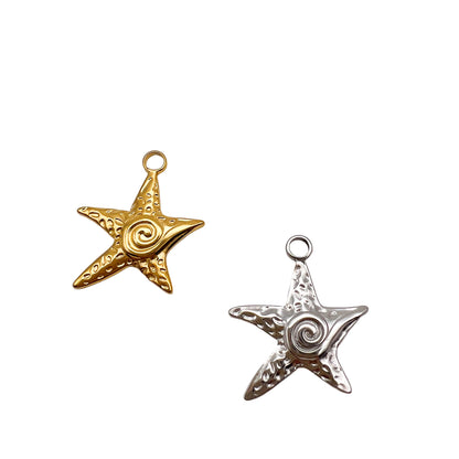 Gold and silver star-shaped pendants on a light gray background